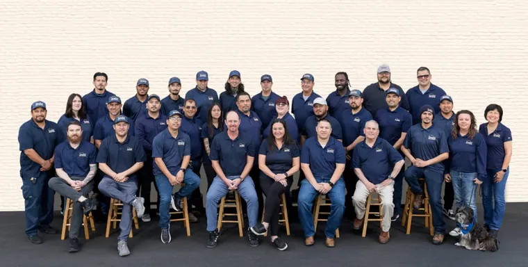 Thrasher crew providing premium pest service